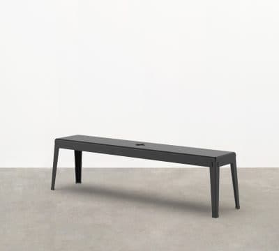 The Good One Bench Seat is an industrial style bench seat prized for its industrial aesthetic and durability within outdoor contexts.