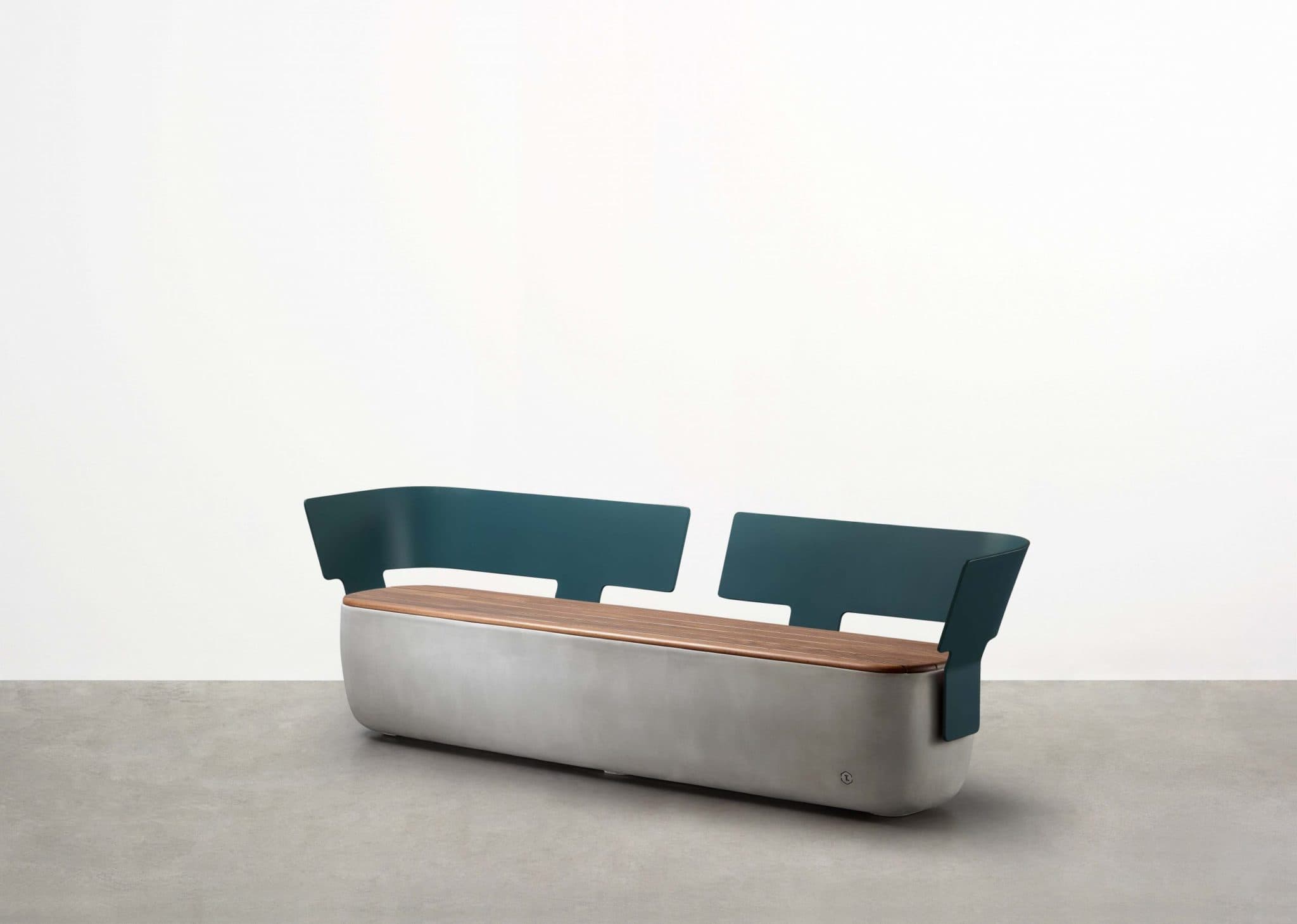 Designed by Adam Goodrum for Tait, the Scape Long Module is a long concrete bench seat that forms part of a fluid, triadic modular system.