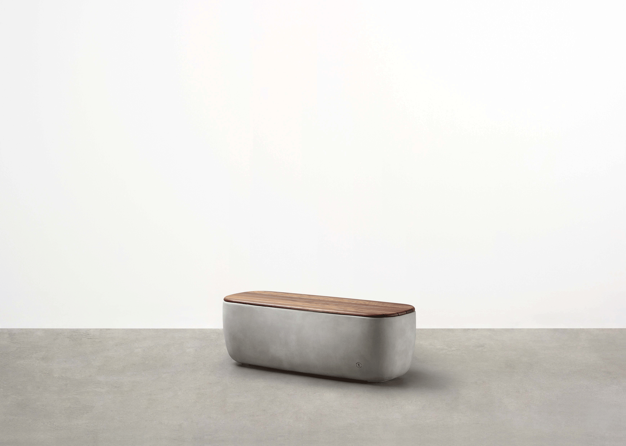 Designed by Adam Goodrum for Tait the Scape Module - a modular concrete bench seat - forms part of a fluid, triadic modular system.