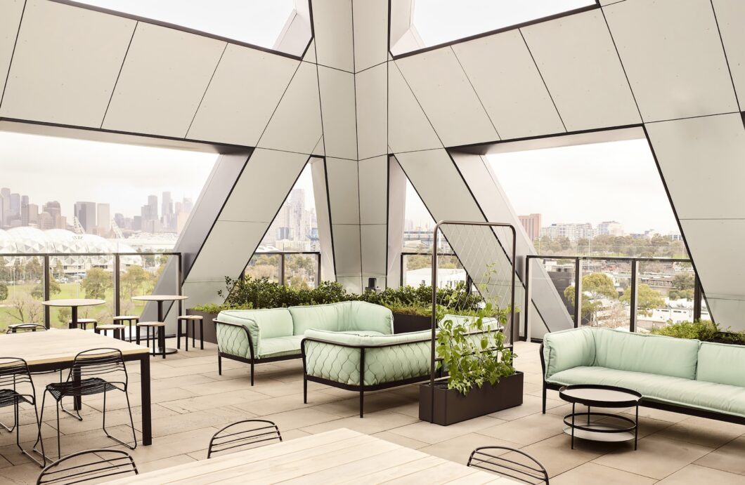 SEEK workplace rooftop by HASSELL featuring Trace sofa by Tait