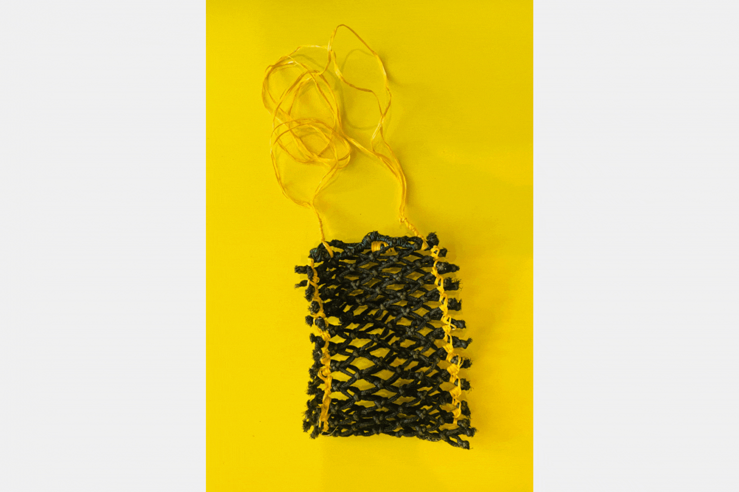 Traditional Indigenous Australian Dilly bag woven with ghost nets marine debris